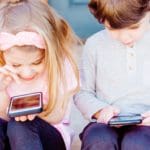Children using mobile devices