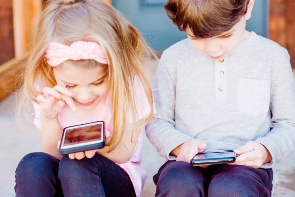 Children using mobile devices